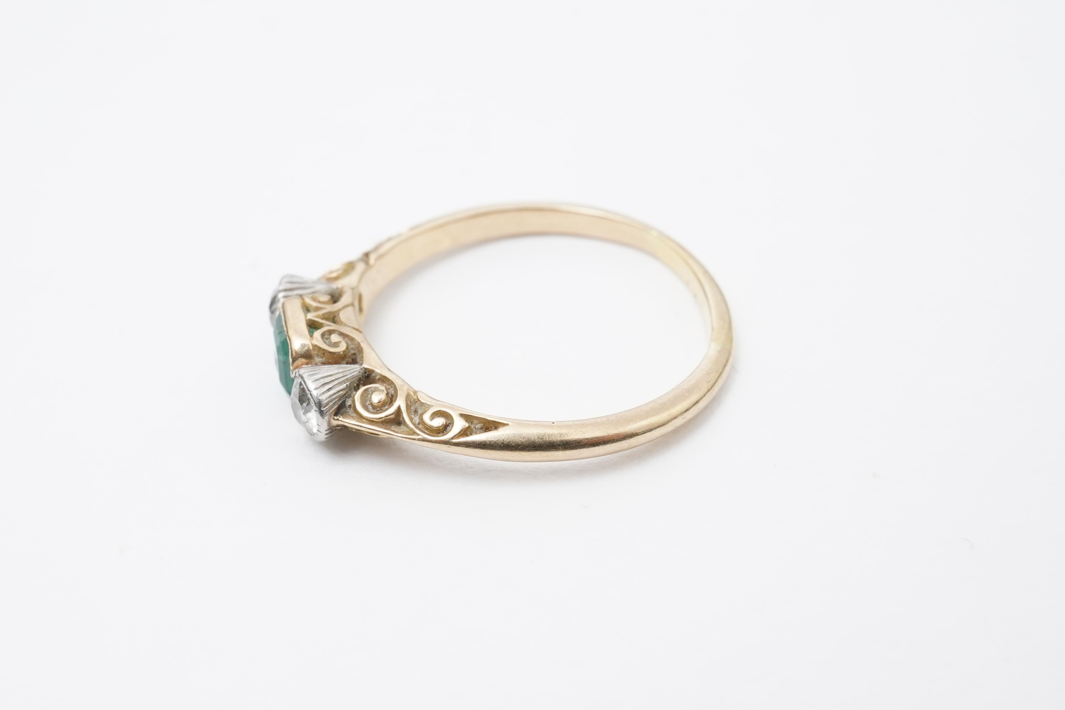 An emerald and diamond ring, early 20th century